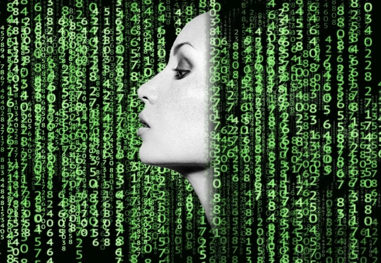 This shows a woman's face surrounded by computer code