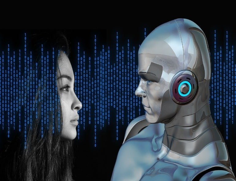 This shows a woman and a robot looking at eachother
