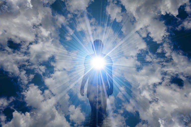 This shows a man in clouds, surrounded by bright light