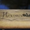 This shows the word mama, a drawing of a baby and a heart