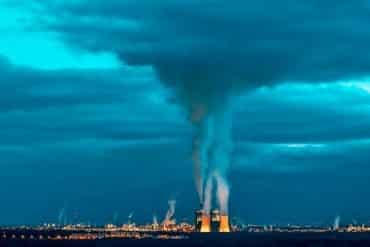 This shows cooling towers and smoke