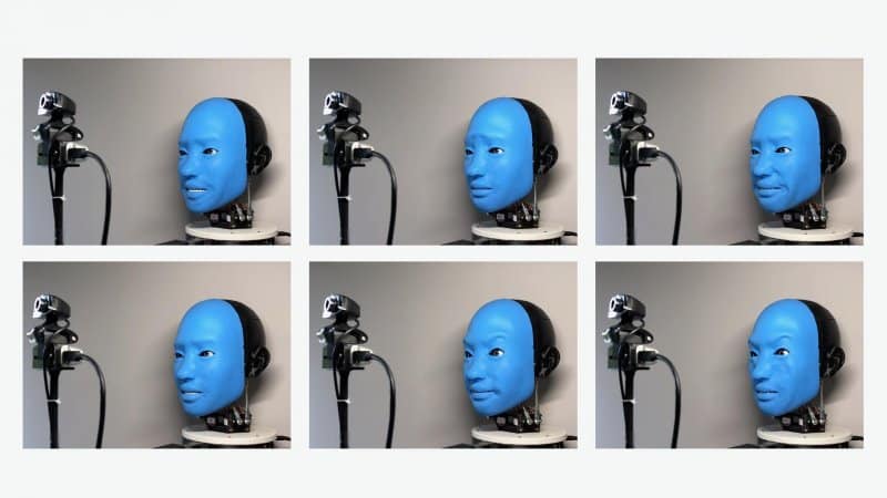 Isso mostra um robô de rosto azul dando diferentes expressões de feliz a louco
