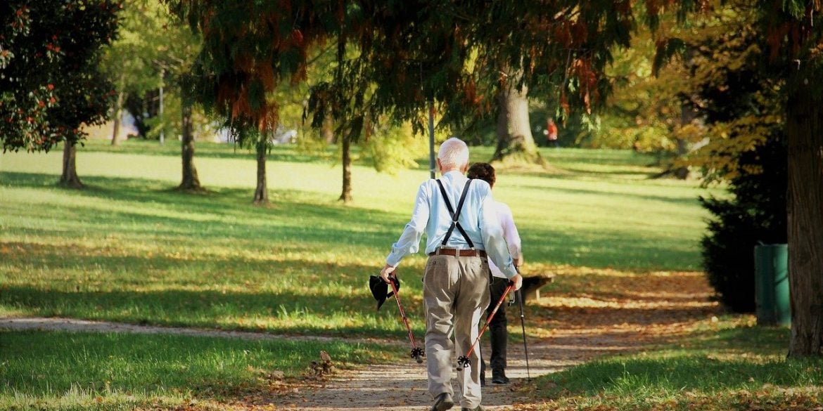 This shows an older man walking