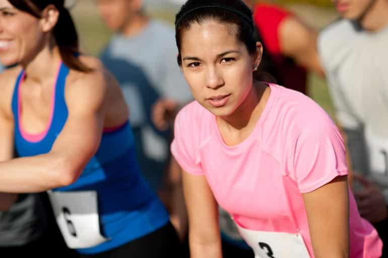 This shows a woman about to run a race