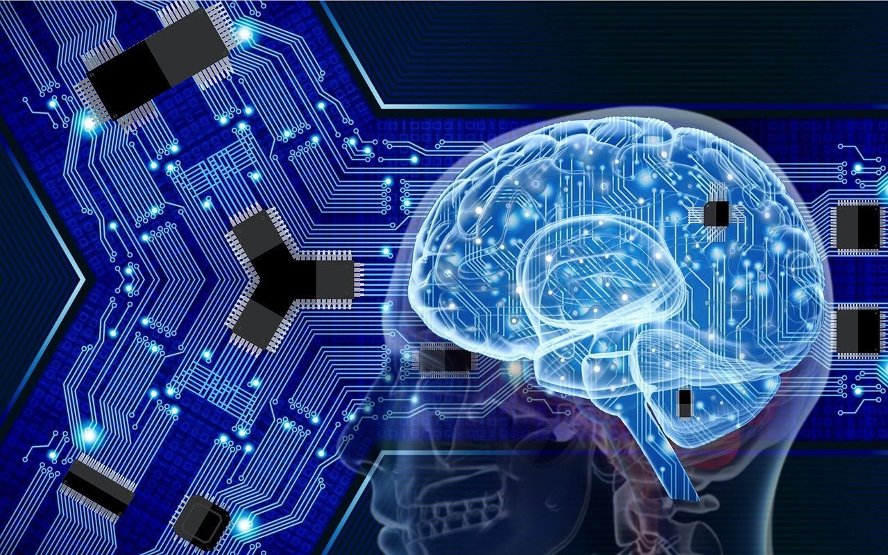 This shows a brain and computer chips