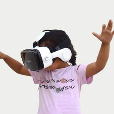 This shows a little girl in a VR system