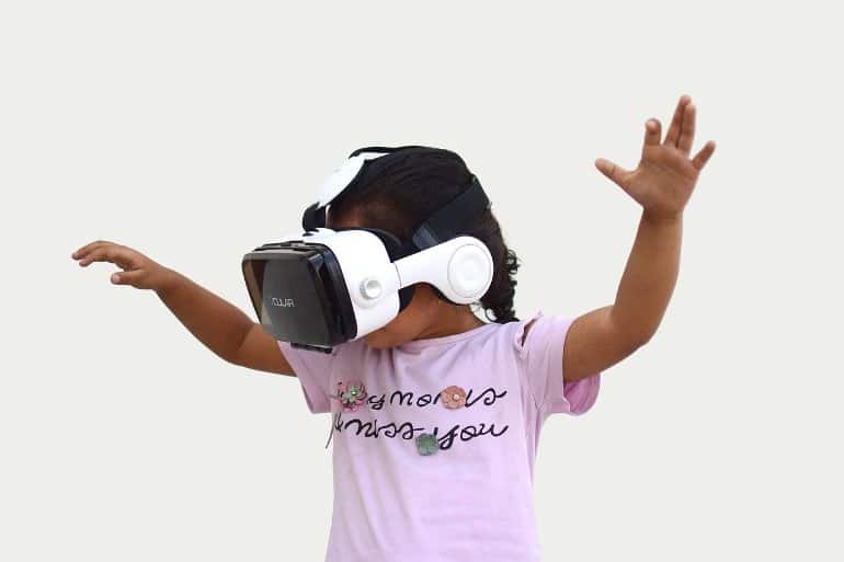 This shows a little girl in a VR system