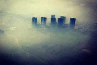 This shows a smoggy city skyline