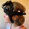 This shows a woman in the headband device