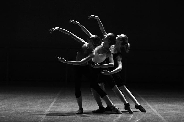This shows three dancers performing