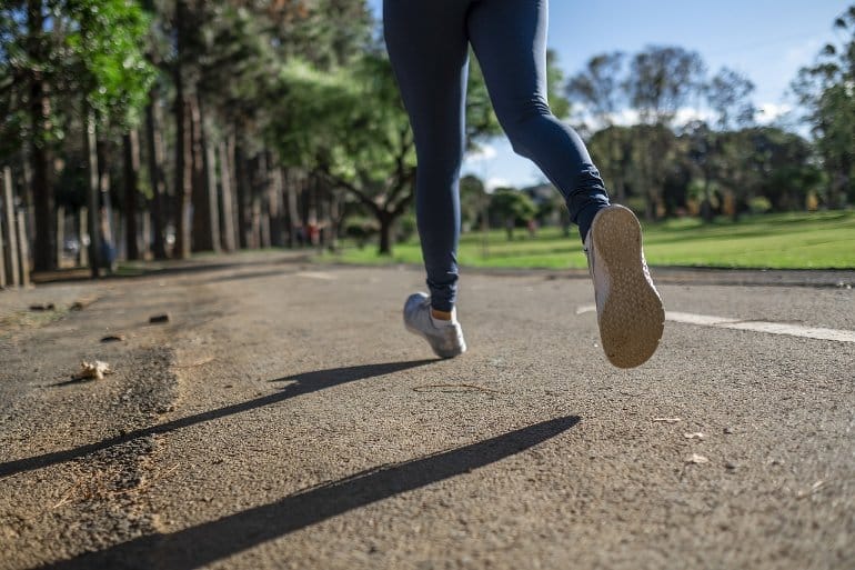 This shows a woman running