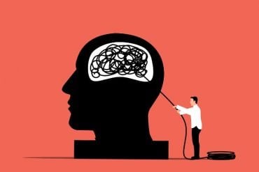 This is a cartoon of a head and a man standing behind, pulling out string from the brain