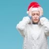 This shows a stressed woman in a santa hat