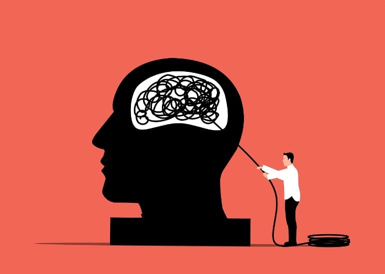 This shows a person pulling string out of a brain in a cartoon