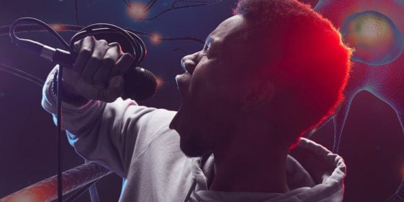 This shows a man singing with neurons as a backdrop