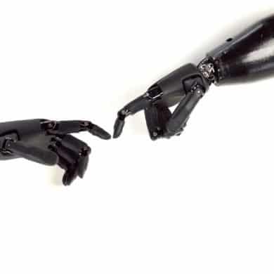 This shows two bionic arms. The fingers are touching