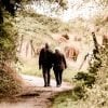 This shows an older couple walking