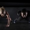 This shows a man and woman exercising