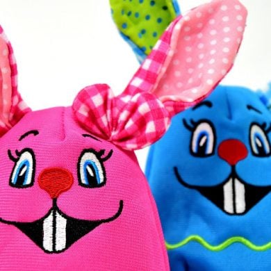 This shows a pink and blue toy bunnies