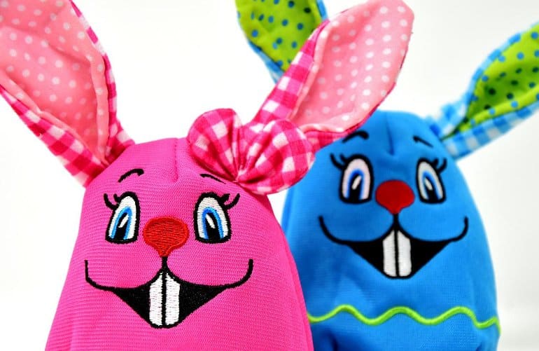 This shows a pink and blue toy bunnies