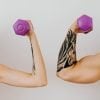 This shows a man and a woman's arm holding weights