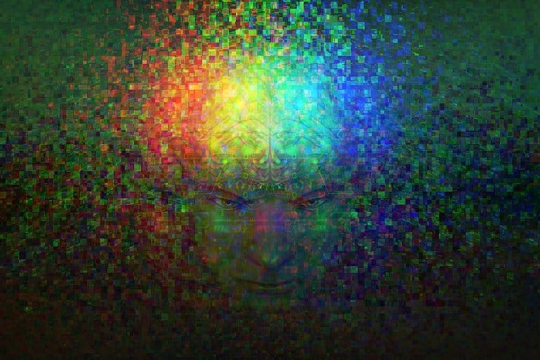 Dieses zeigt ein Gehirn und einen Kopf hinter Regenbogenpunkten