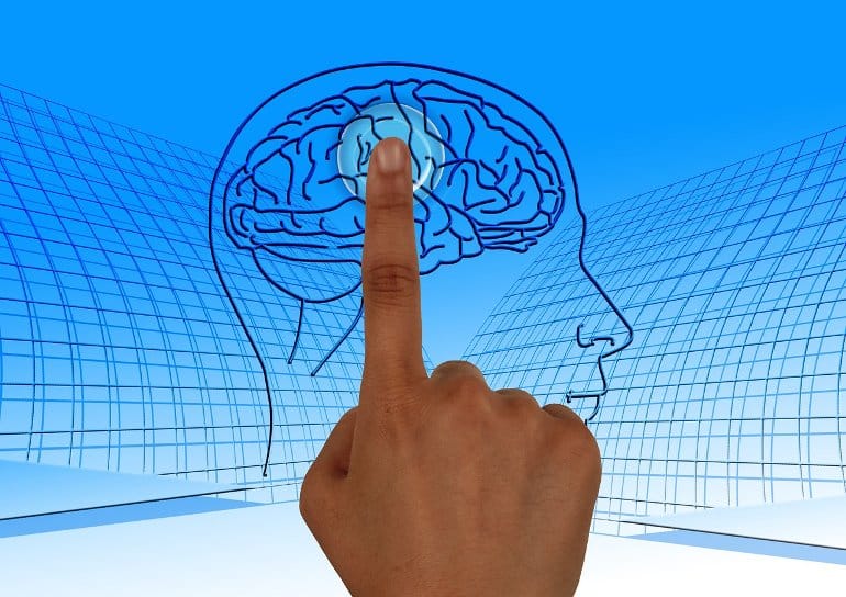 This shows a finger touching a picture of a brain