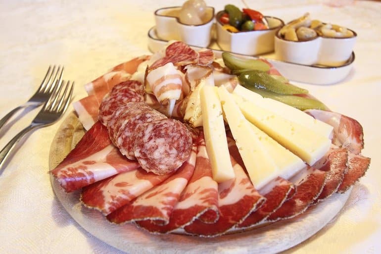 This shows a plate of cured meats