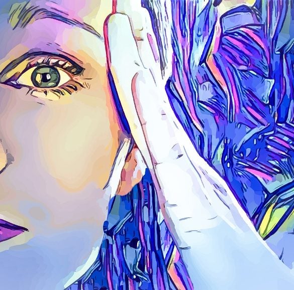 This shows a person holding her head