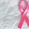 This shows a pink breast cancer ribbon