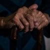 This shows an older person's hands