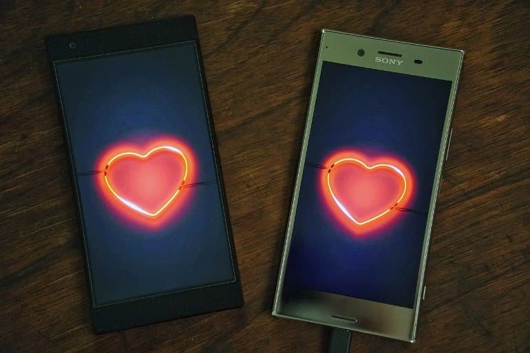 This shows cell phones with hearts on them