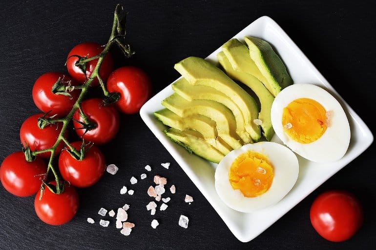 This shows a plate of egg and avacado