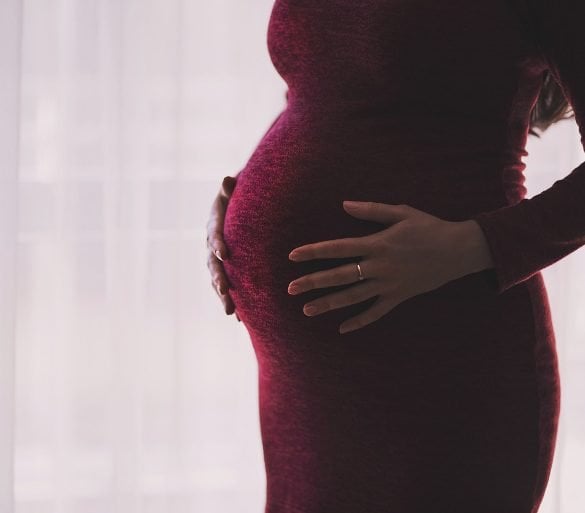 This shows a pregnant woman