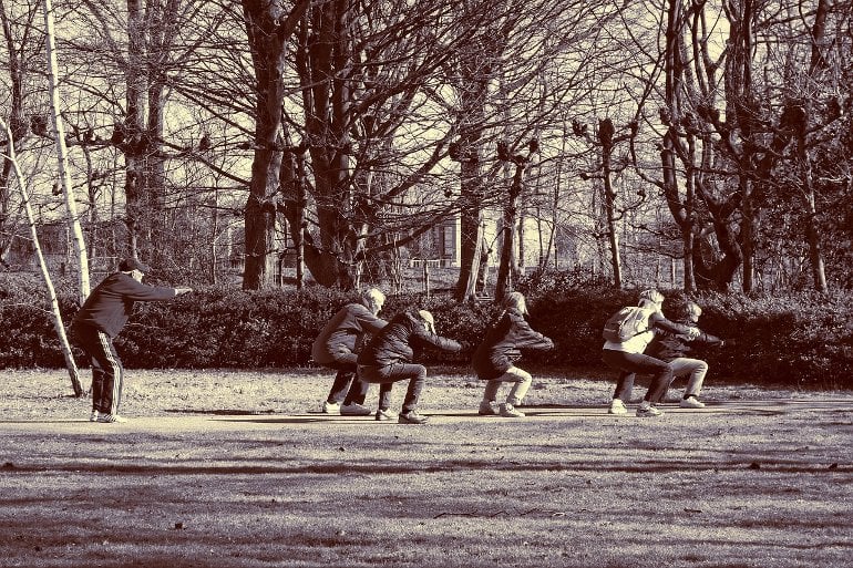 This shows a group of people exercising