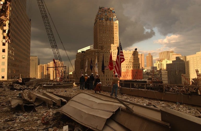 This shows first responders and construction workers at the scene of the WTC