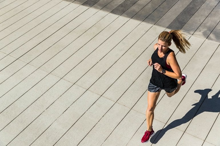 This shows a woman running