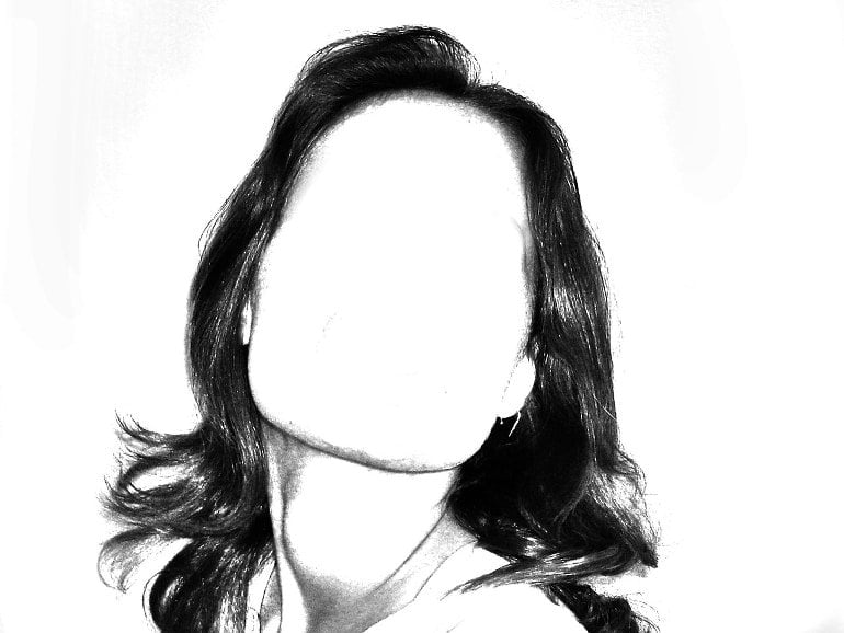 This shows a woman with a blank face