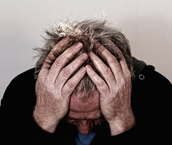 This shows a man in pain