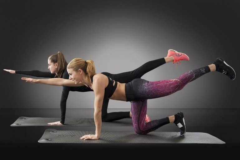 This shows two women exercising