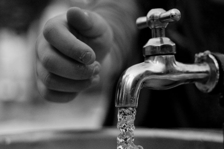 This shows water coming out of a tap