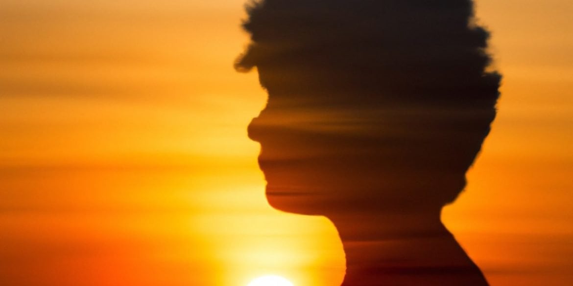 This shows the outline of a head and a sunset