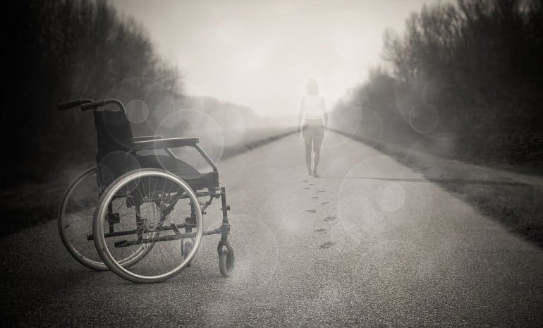 This shows a person walking away from a wheelchair