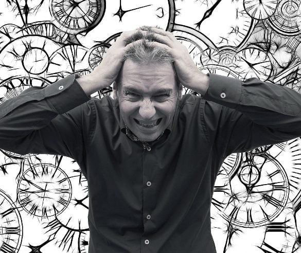 This shows a stressed man and drawings of clocks