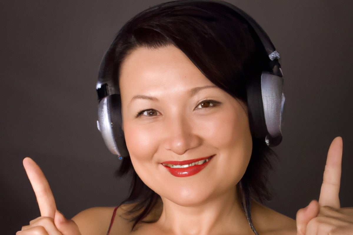 This shows a woman listening to music