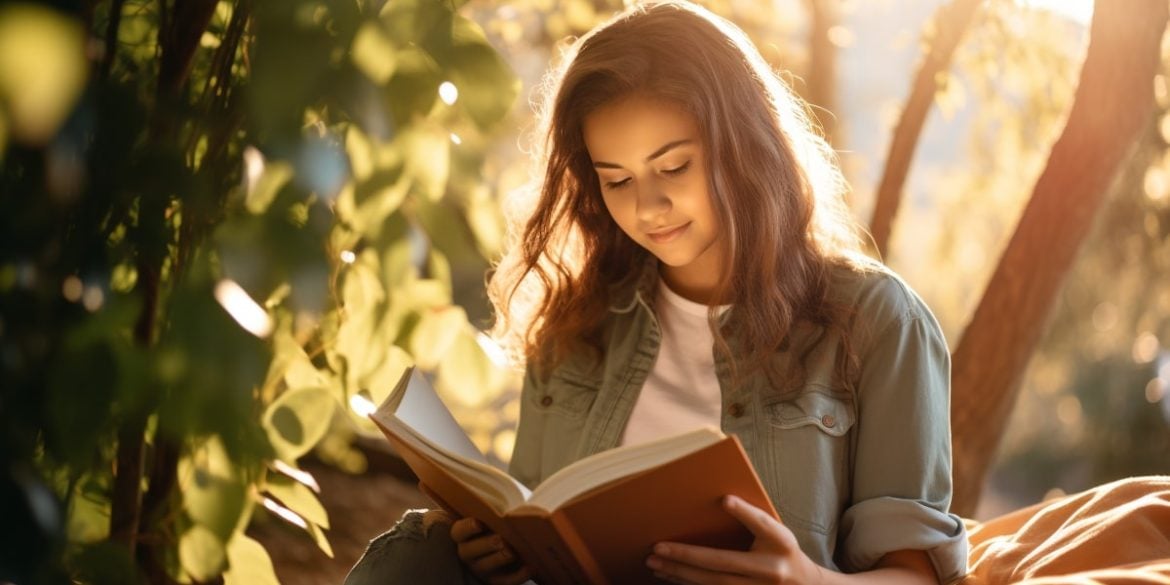 This shows a young girl reading.