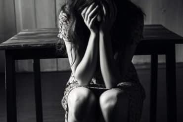This shows a depressed woman.