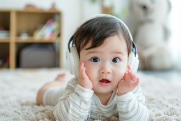 This shows a baby in headphones.