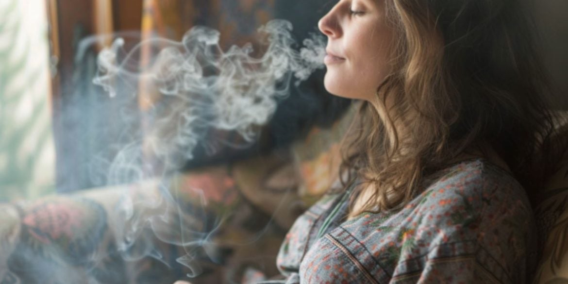 This shows a pregnant woman surrounded by smoke.