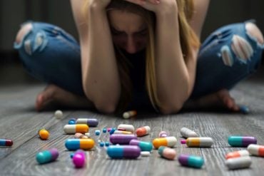 This shows a depressed woman and pills.